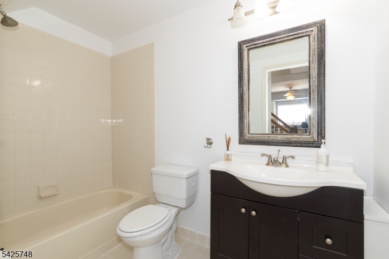 10 Crestmont Road Bedminster, NJ 07921 - Photo 26 of 41 a bathroom with a sink a toilet and shower
