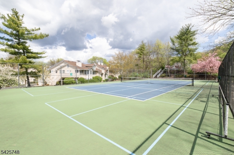 10 Crestmont Road Bedminster, NJ 07921 - Photo 38 of 41 a view of an outdoor space and tennis court