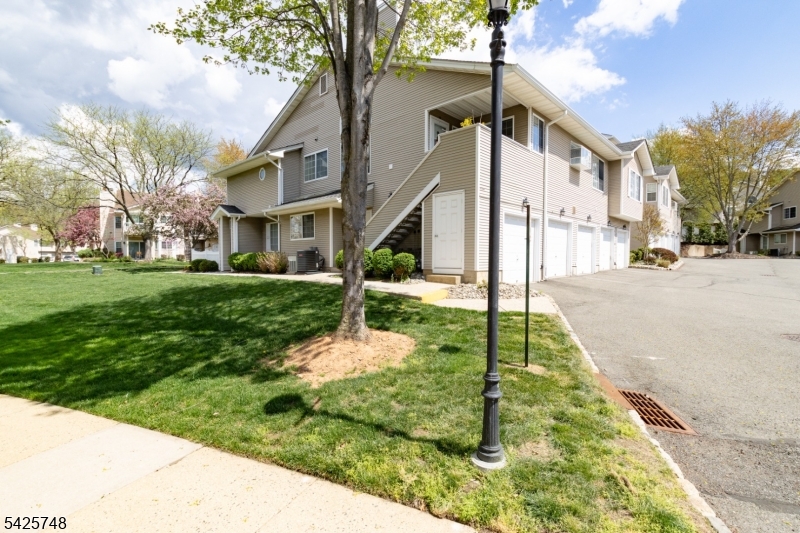 10 Crestmont Road Bedminster, NJ 07921 - Photo 5 of 41 a front view of a house with a yard