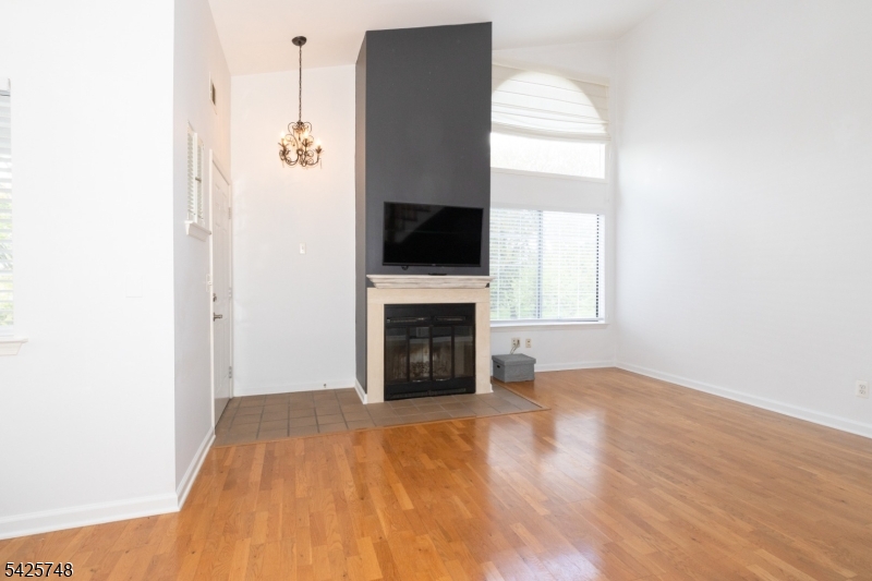 10 Crestmont Road Bedminster, NJ 07921 - Photo 8 of 41 a view of a livingroom with a fireplace