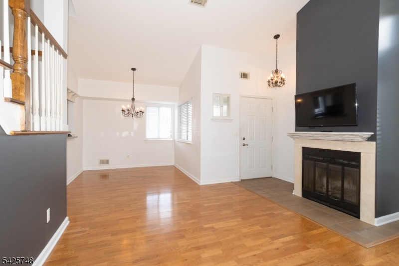 10 Crestmont Road Bedminster, NJ 07921 - Photo 10 of 41 a view of empty room with a fireplace