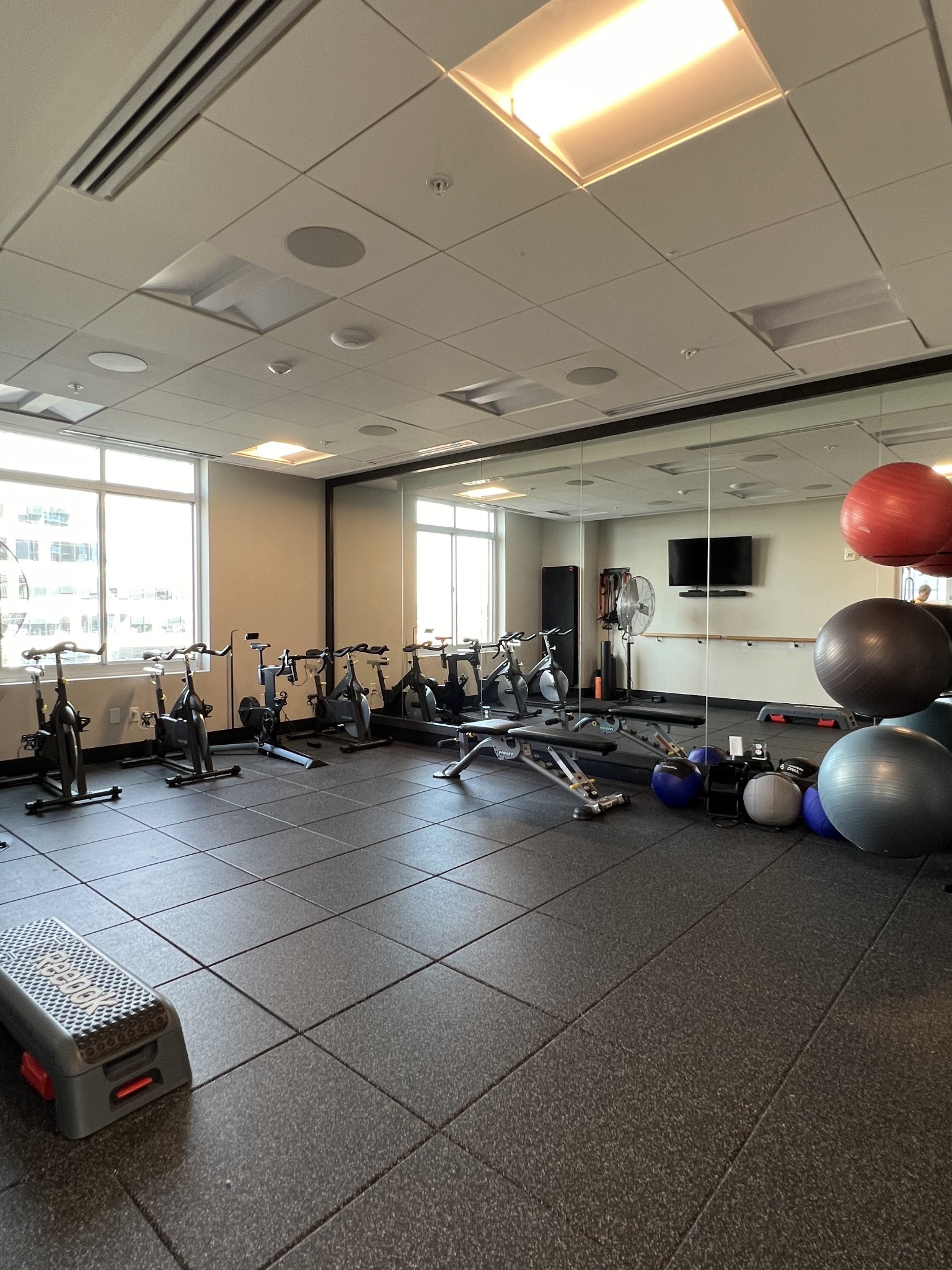 20 Rutledge Street, Unit 704 Nashville, TN 37210 - Photo 16 of 40 a room with gym equipment and a large window