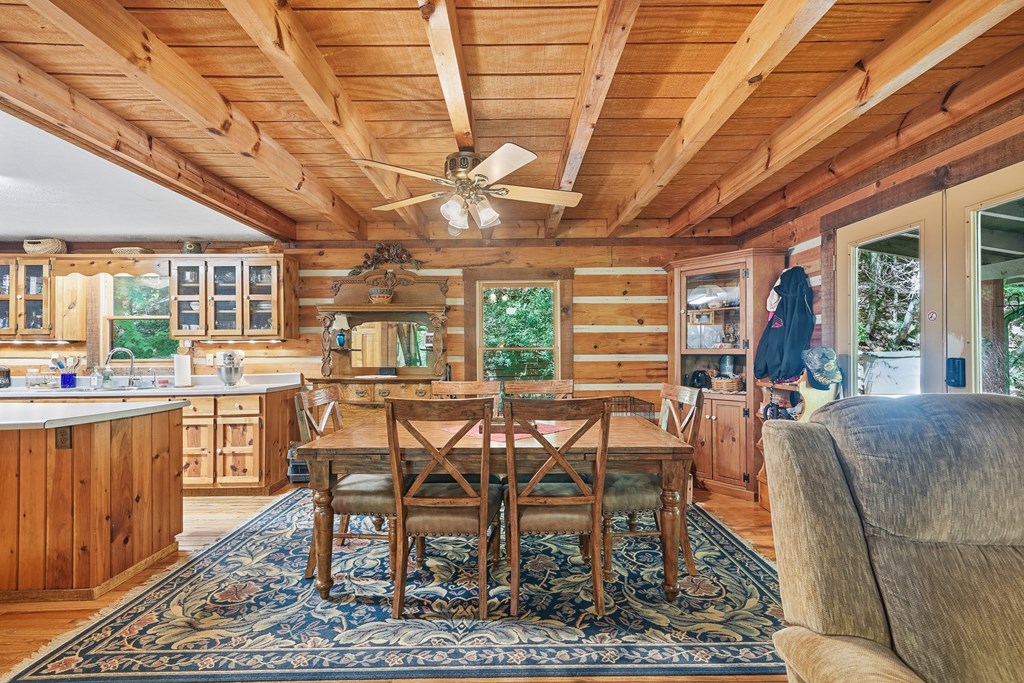 86 Tipton Court Cherry Log, GA 30522 - Photo 74 of 81 a view of a dining room with furniture window and wooden floor