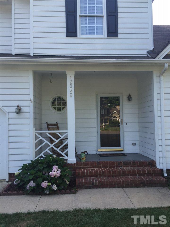 12220 Jarden Court Raleigh, NC 27613 - Photo 2 of 17 a front view of a house