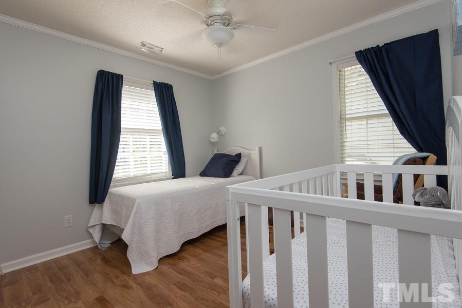 12220 Jarden Court Raleigh, NC 27613 - Photo 15 of 17 a bedroom with windows