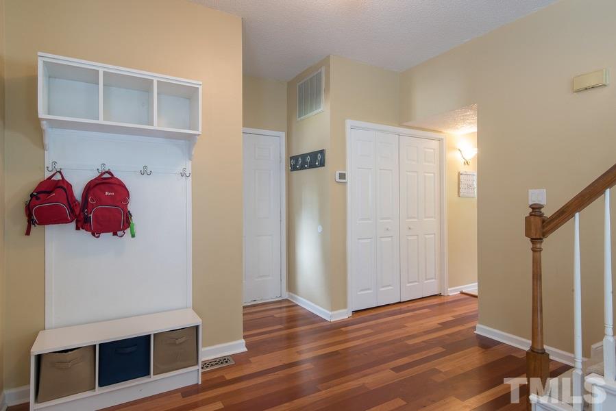 12220 Jarden Court Raleigh, NC 27613 - Photo 3 of 17 a view of room with wooden floor