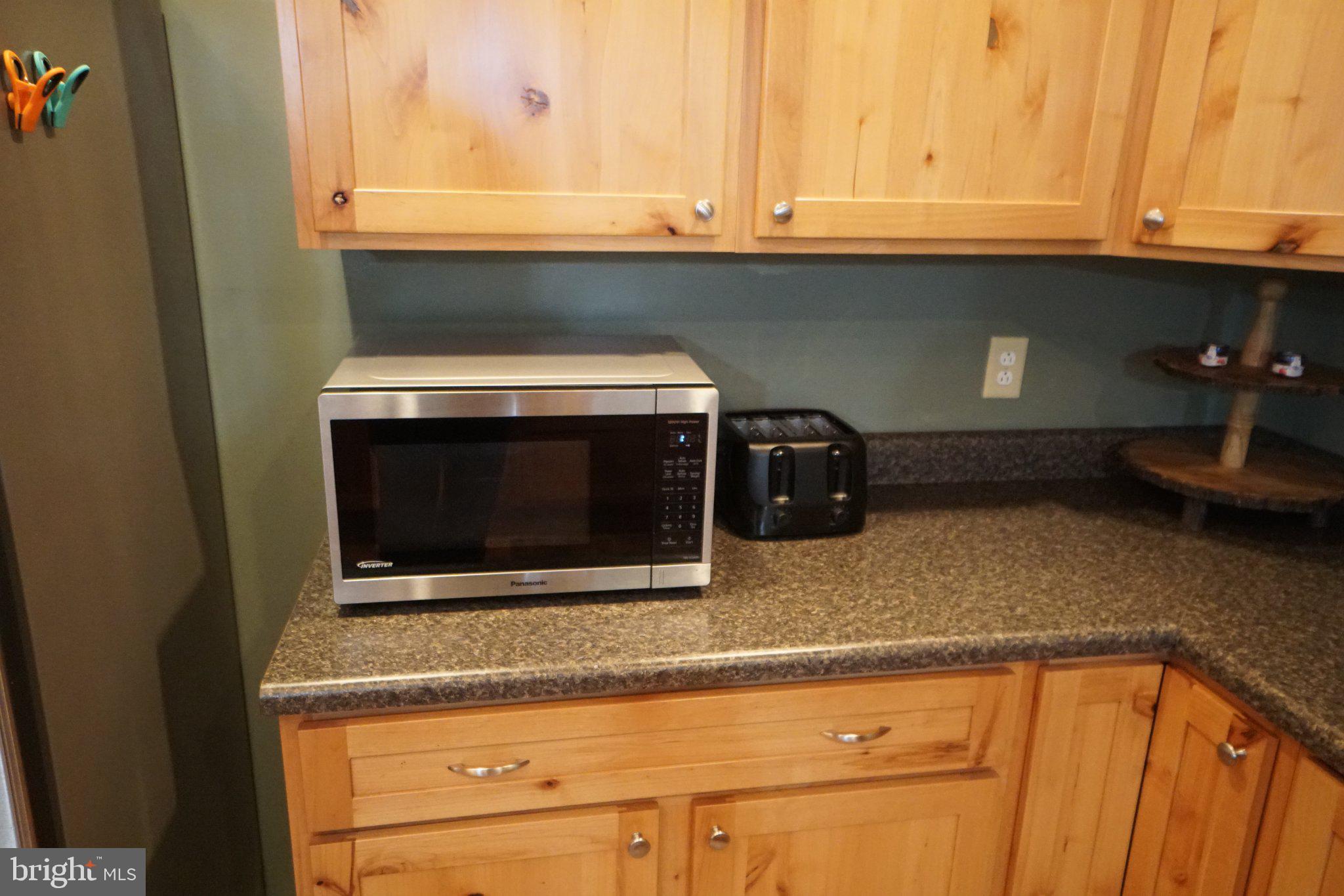 150 Sharp Ridge Lane Franklin, WV 26807 - Photo 38 of 69 Modern kitchen with warm wood accents.