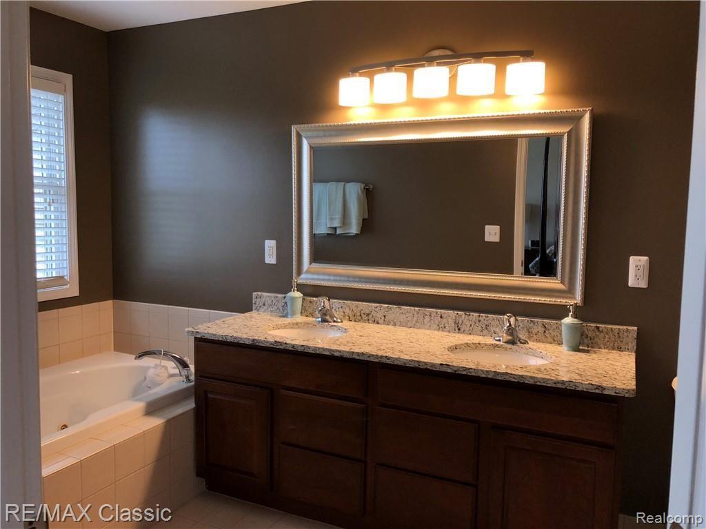 564 Ridge Point Drive Dundee, MI 48131 - Photo 41 of 64 Master bath has a spa-like feel