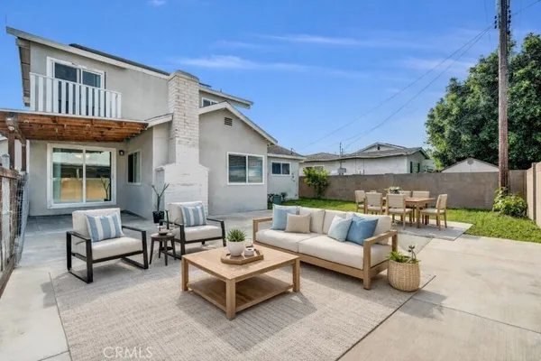 a view of a house with a yard and garage