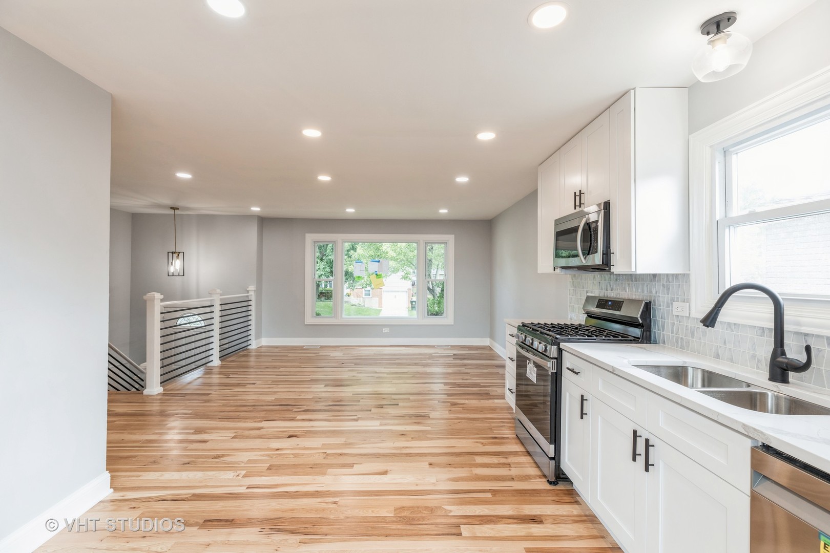 5657 Dover Road Oak Forest, IL 60452 - Photo 8 of 20 a kitchen with stainless steel appliances a sink stove and cabinets
