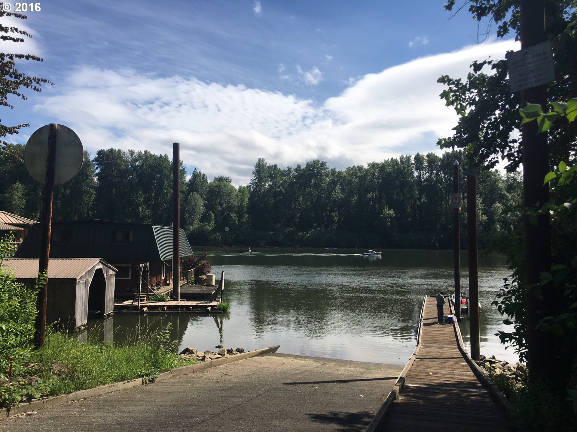 24514 Northwest Sauvie Island Road Portland, OR 97231 - Photo 10 of 16 a lake view with boat