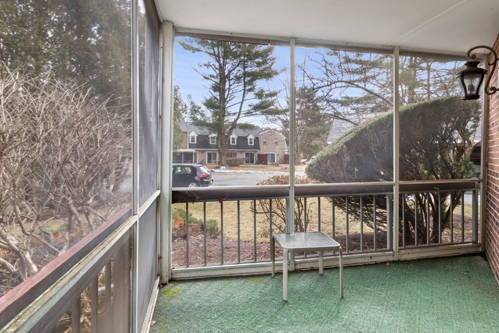 33 Christopher Drive, Unit A Stoughton, MA 02072 - Photo 11 of 23 a view of a balcony with furniture