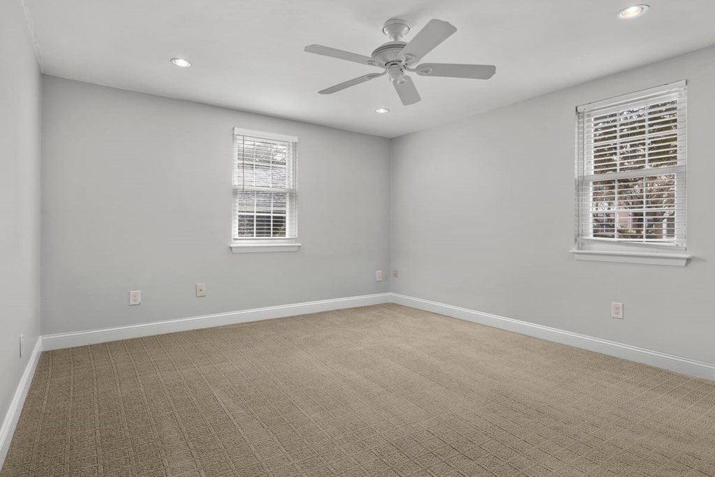 33 Christopher Drive, Unit A Stoughton, MA 02072 - Photo 14 of 23 an empty room with a window