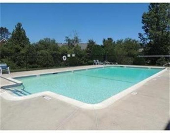 33 Christopher Drive, Unit A Stoughton, MA 02072 - Photo 20 of 23 a view of a golf course with a park