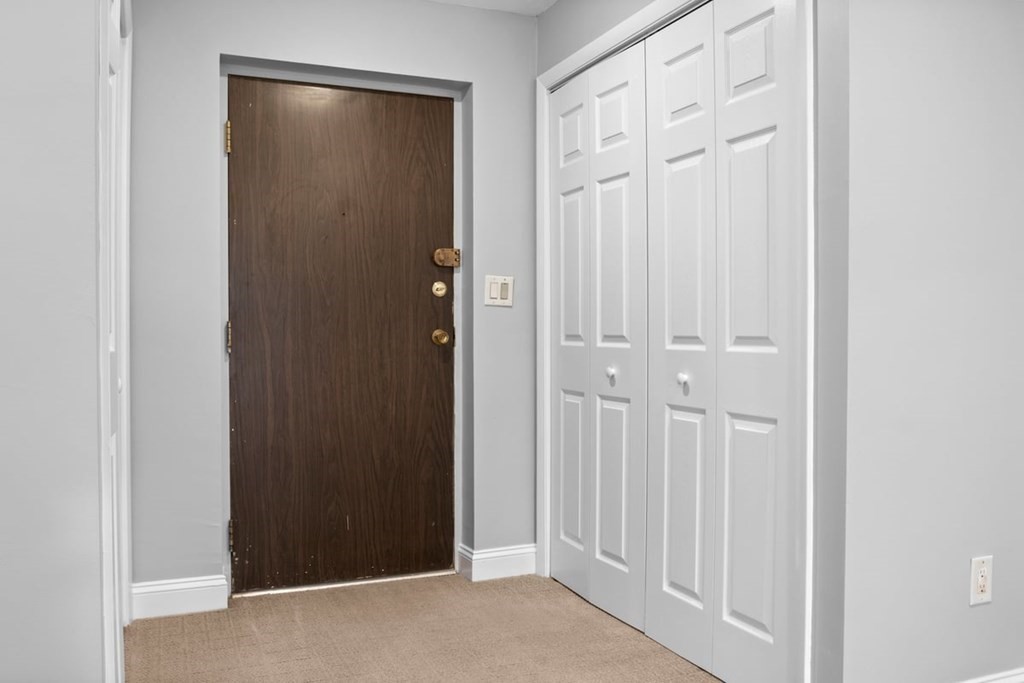 33 Christopher Drive, Unit A Stoughton, MA 02072 - Photo 9 of 23 an empty room with closet area