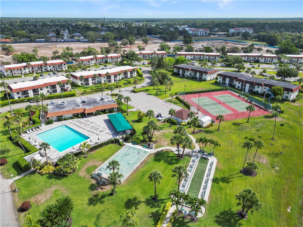 4372 27th Court Southwest, Unit 301 Naples, FL 34116 - Photo 2 of 37 an aerial view of multiple house