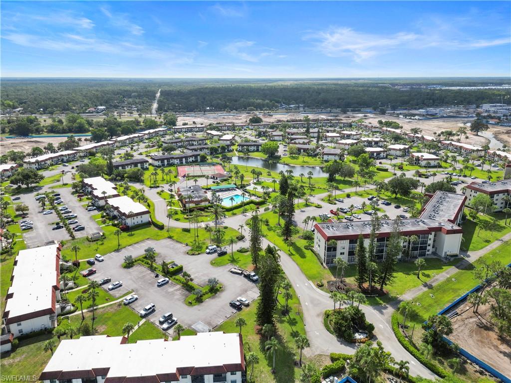 4372 27th Court Southwest, Unit 301 Naples, FL 34116 - Photo 30 of 37 a view of a city