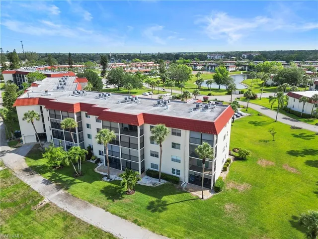 a view of a big room with a big yard and plants