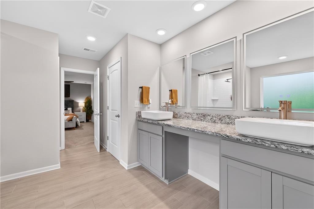 480 Overlook Road Covington, GA 30014 - Photo 6 of 20 a bathroom with a sink and a mirror
