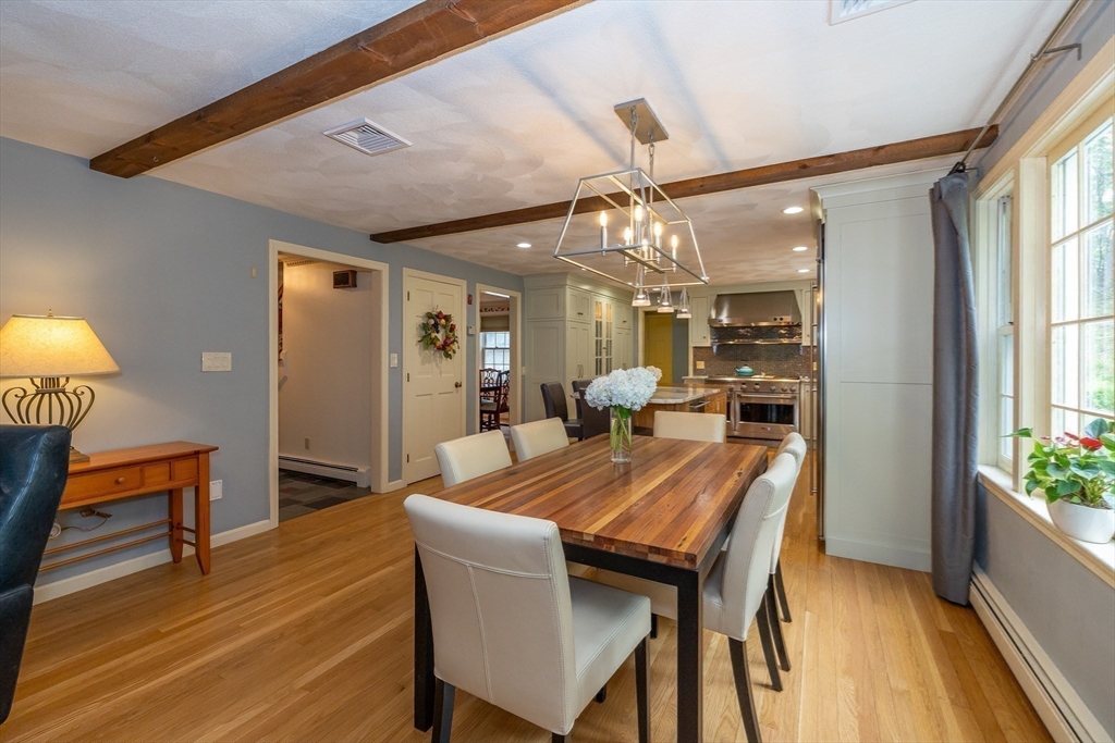 759 Main Street Boxford, MA 01921 - Photo 11 of 35 a view of a dining room with furniture and a chandelier
