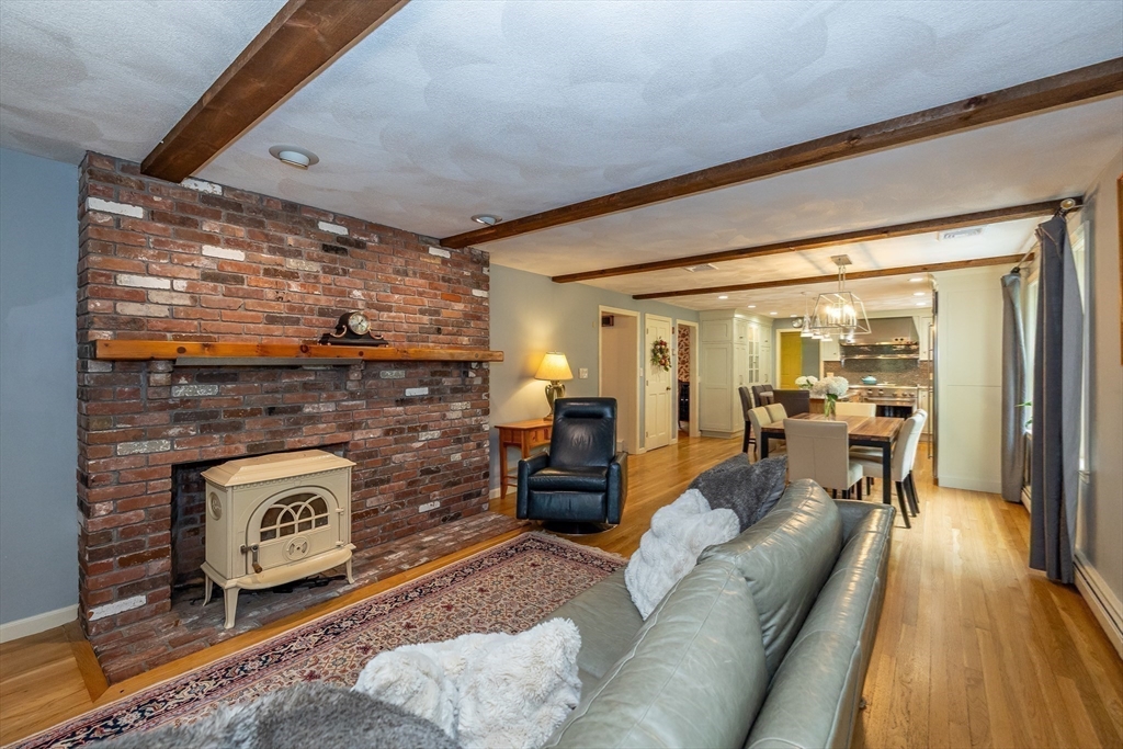 759 Main Street Boxford, MA 01921 - Photo 16 of 35 a living room with furniture and a fireplace