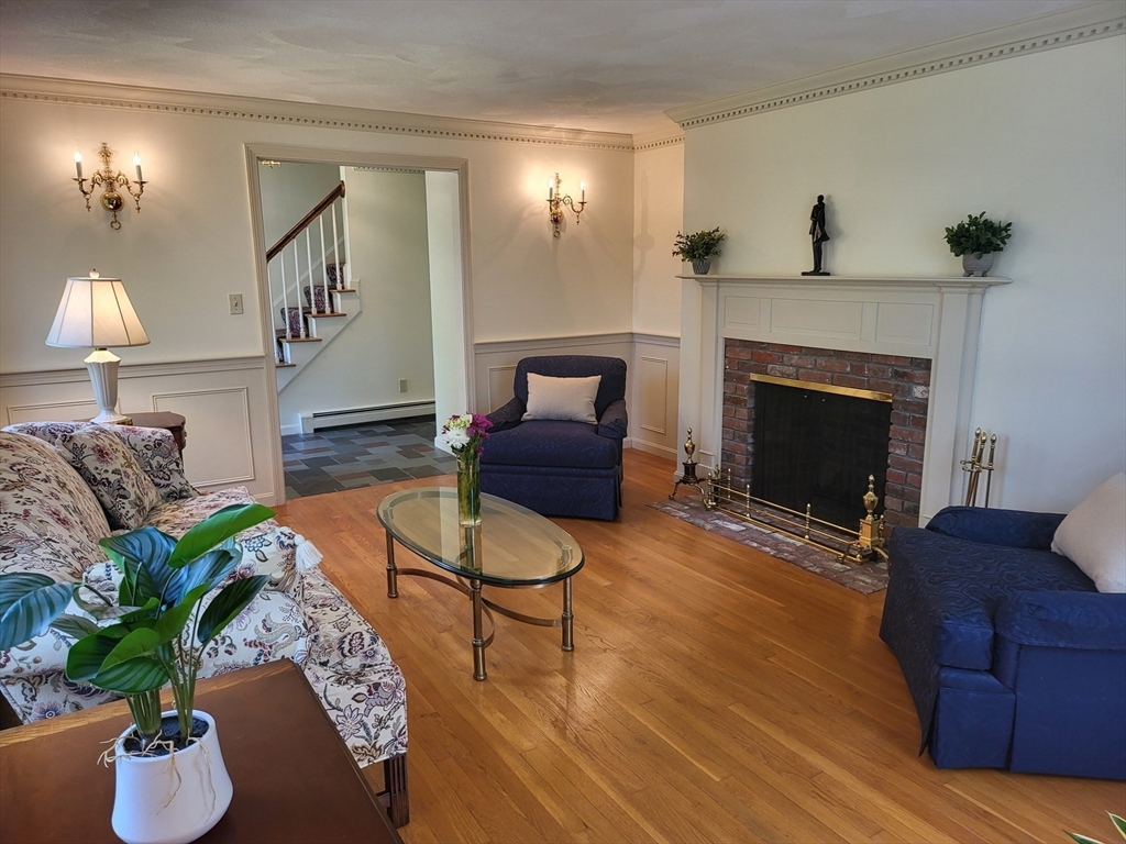 759 Main Street Boxford, MA 01921 - Photo 19 of 35 a living room with furniture and a fireplace