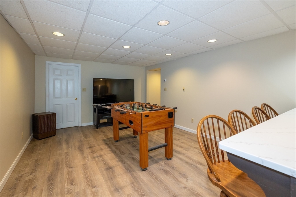 759 Main Street Boxford, MA 01921 - Photo 31 of 35 a living room with furniture and a flat screen tv