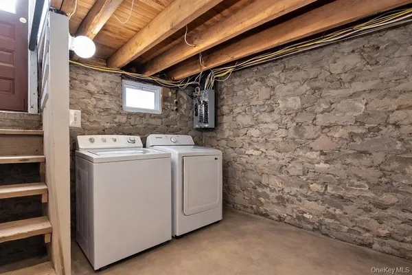 a utility room with dryer and washer