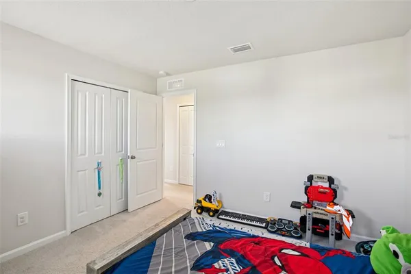 a room with toys and wooden floor