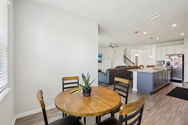a workspace with furniture and wooden floor