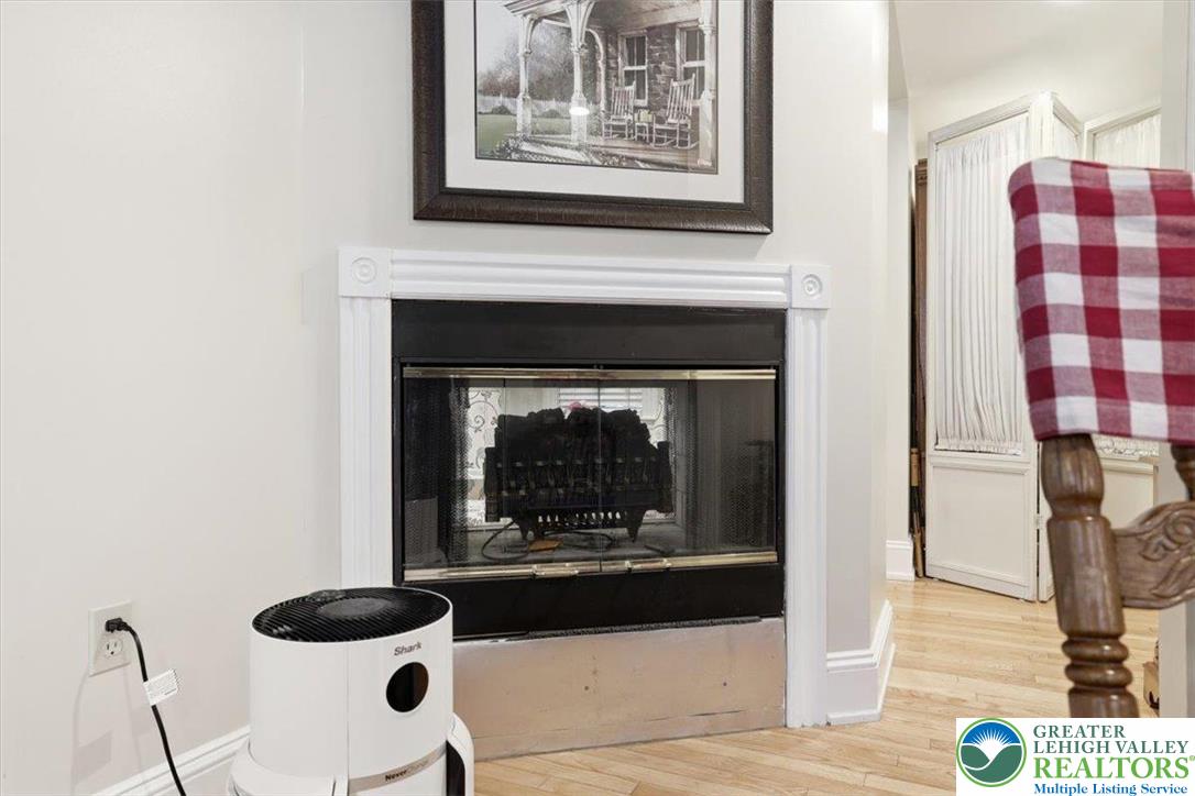 3585 Fairyland Road Lehighton, PA 18235 - Photo 35 of 57 a living room with furniture and a fireplace