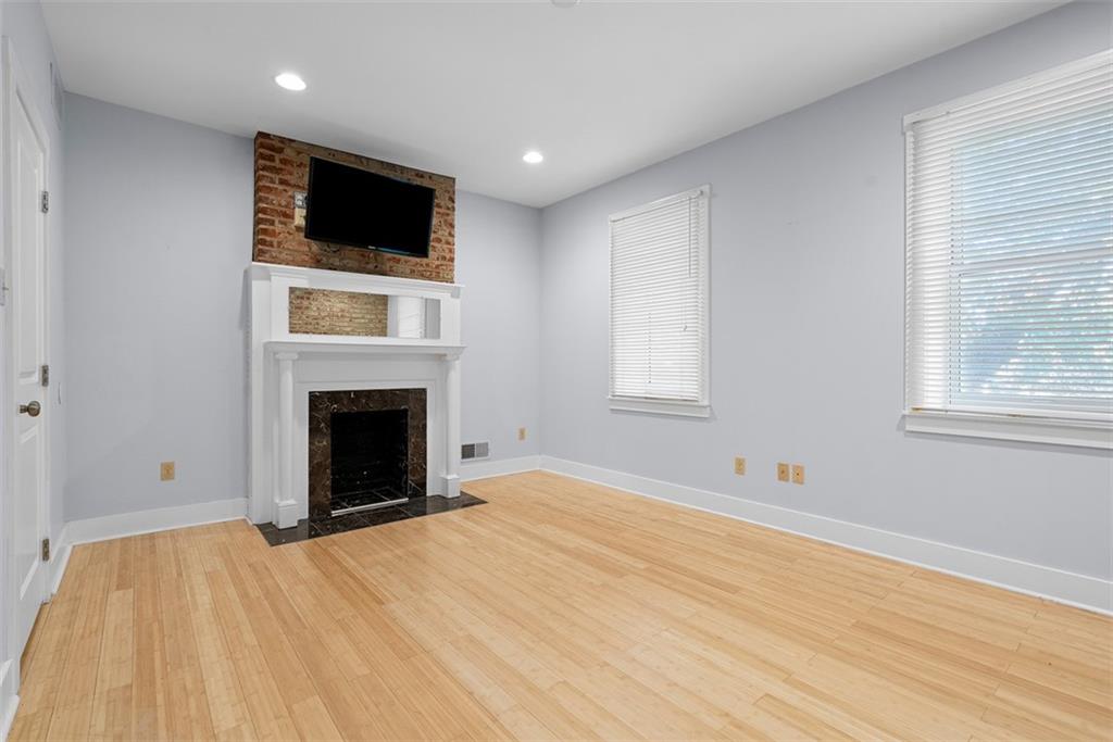 1402 James Street Pittsburgh, PA 15212 - Photo 19 of 30 a view of empty room with a fireplace and a window