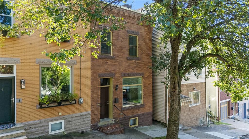 1402 James Street Pittsburgh, PA 15212 - Photo 2 of 30 a view of a house with a tree