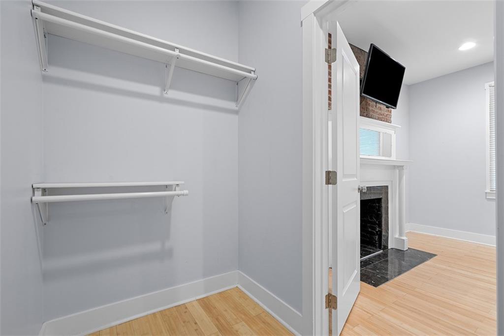 1402 James Street Pittsburgh, PA 15212 - Photo 21 of 30 a view of a livingroom with wooden floor and staircase
