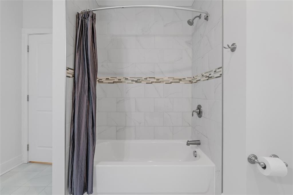 1402 James Street Pittsburgh, PA 15212 - Photo 28 of 30 a close up of a bathtub in a bathroom