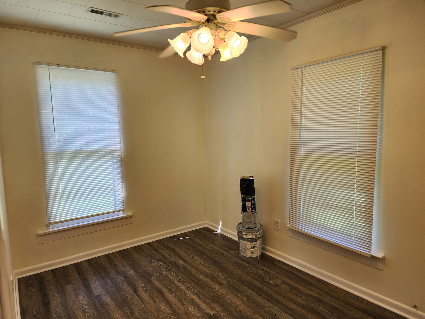1300 West Madison Street Herrin, IL 62948 - Photo 13 of 14 a view of wooden floor and a chandelier in a room