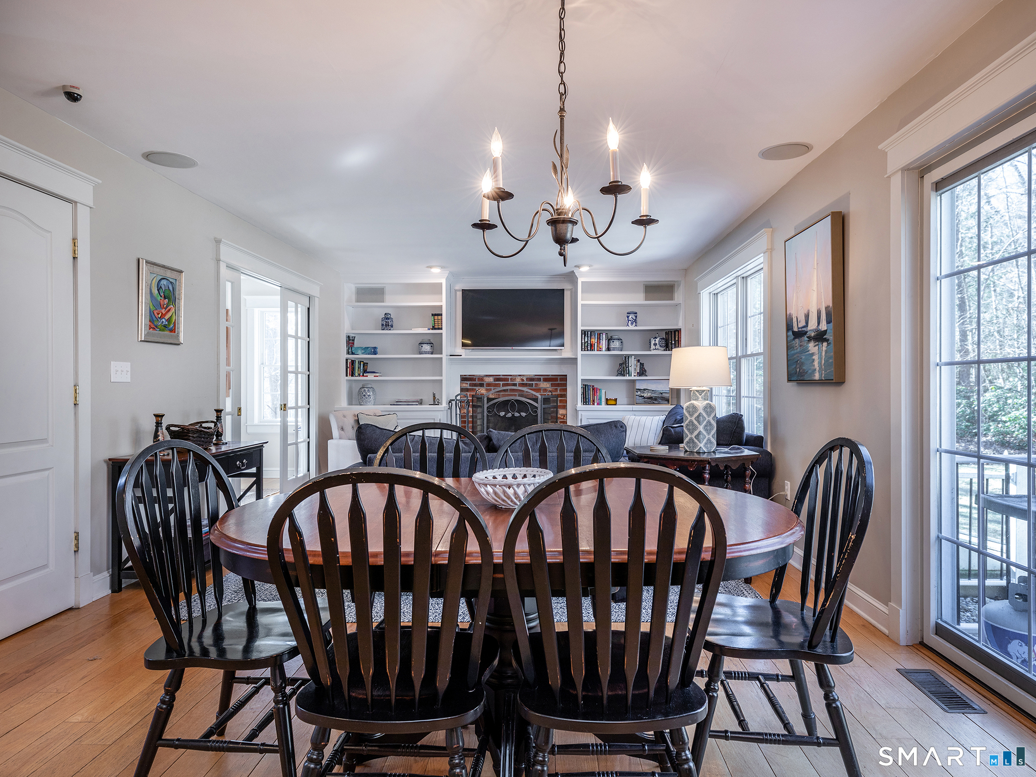 3 Weldon Court Goshen, CT 06756 - Photo 16 of 38 a view of a dining room with furniture window and wooden floor