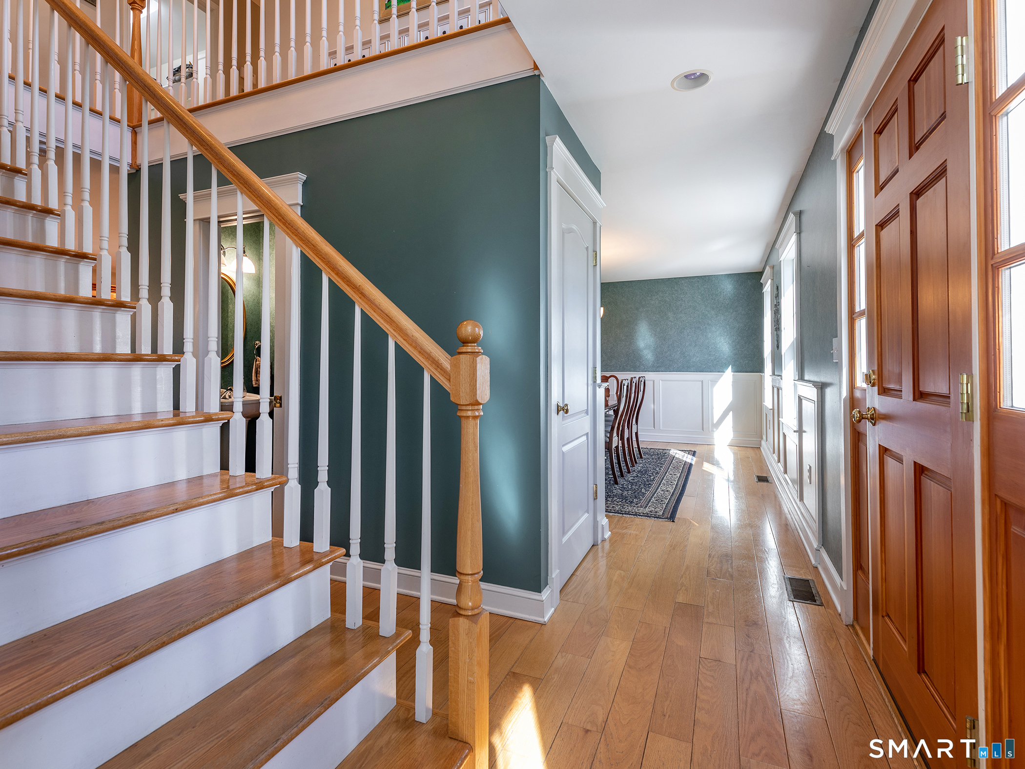 3 Weldon Court Goshen, CT 06756 - Photo 18 of 38 a view of a hallway with wooden floor and staircase