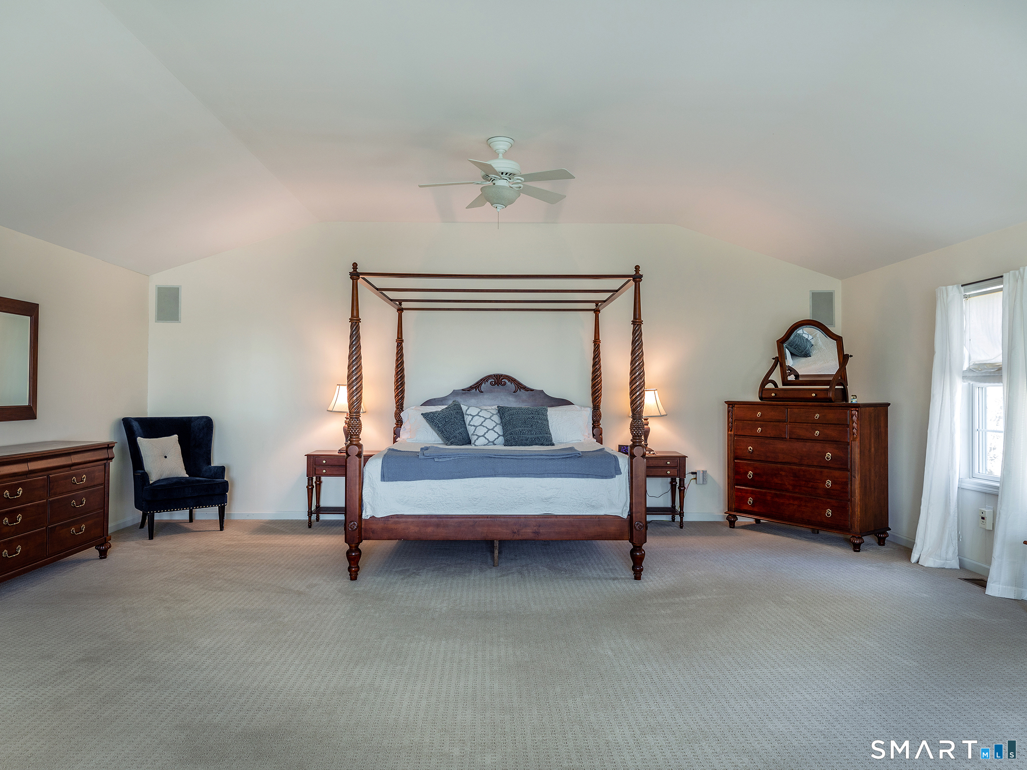 3 Weldon Court Goshen, CT 06756 - Photo 20 of 38 a living room with furniture and a chandelier