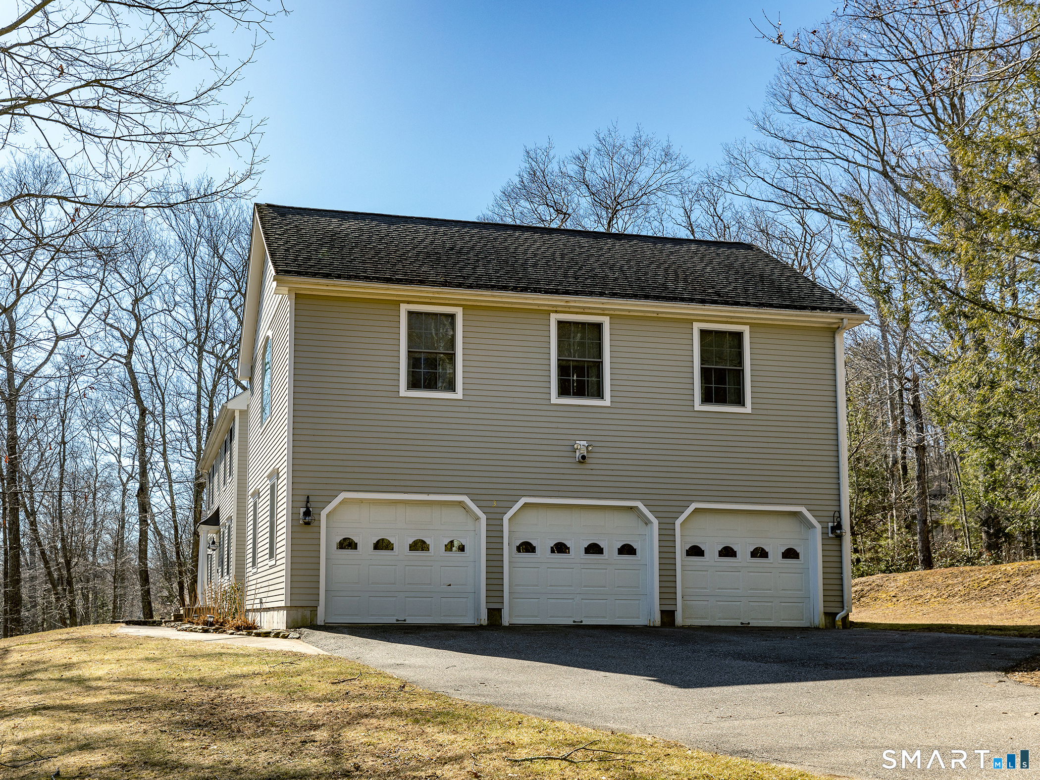 3 Weldon Court Goshen, CT 06756 - Photo 4 of 38 a front view of a house with a yard