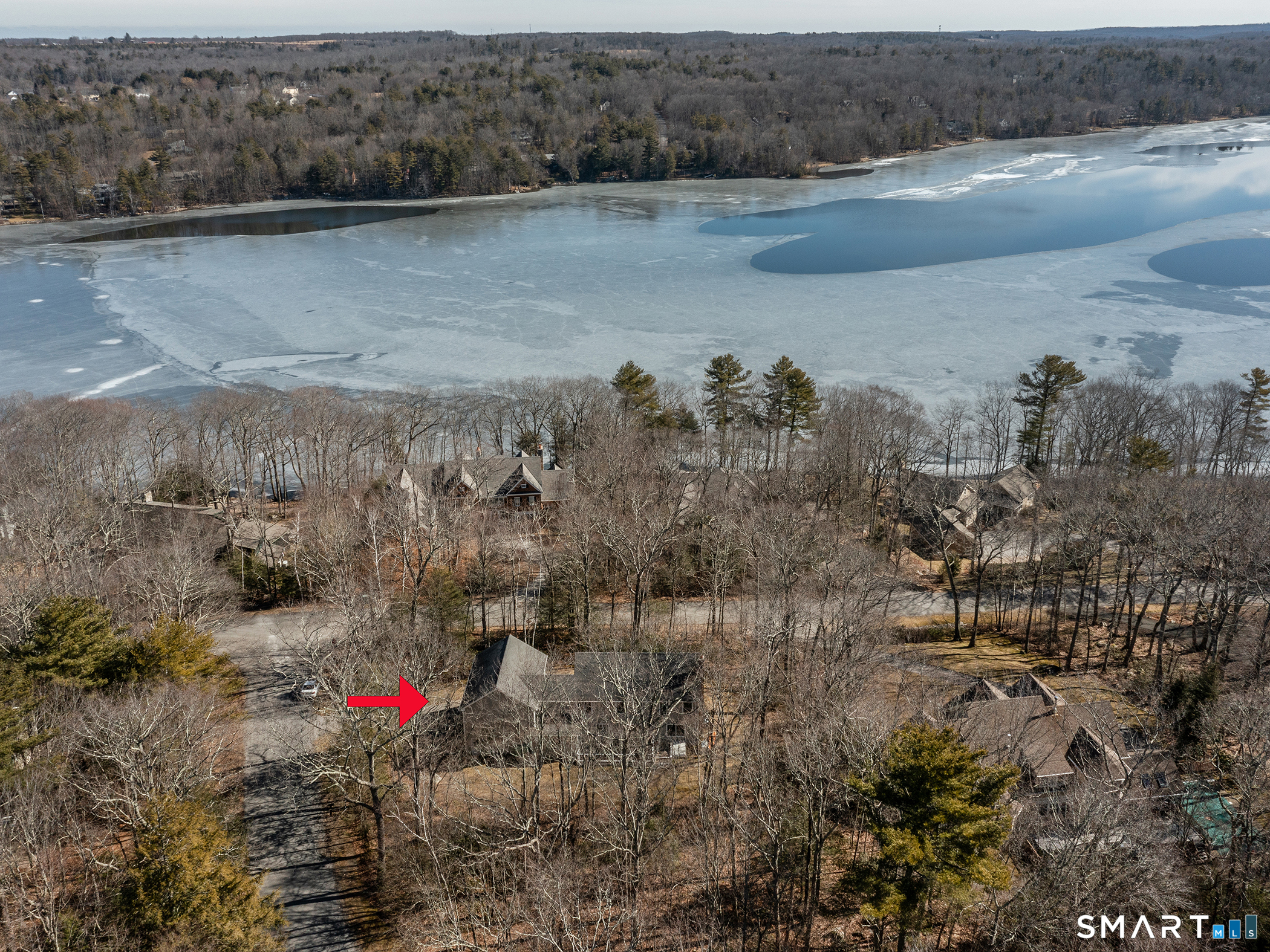 3 Weldon Court Goshen, CT 06756 - Photo 5 of 38 a view of a lake with mountains in the background