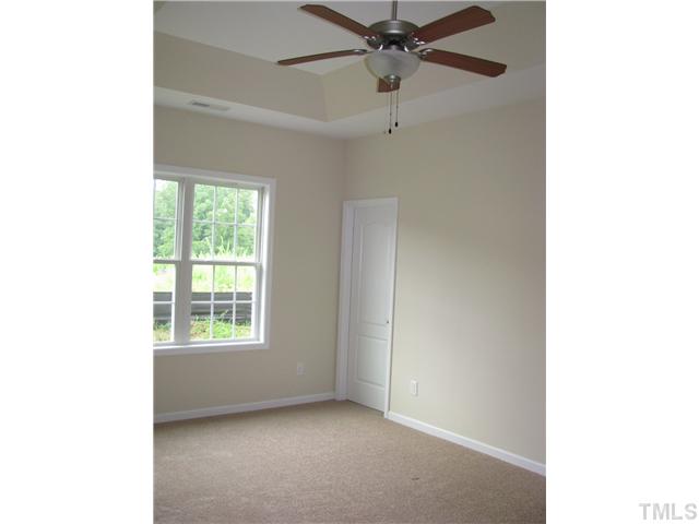 6328 Slopeside Court Raleigh, NC 27610 - Photo 12 of 18 Large Master Bedroom with Trey Ceiling, Ceiling Fan and Walk-in Closet