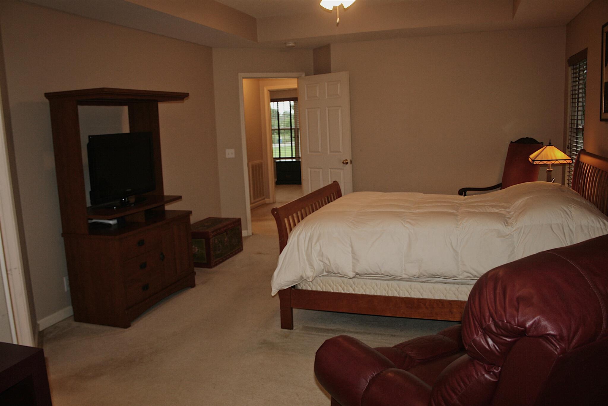 729 Crescent Road Murfreesboro, TN 37128 - Photo 9 of 15 a bedroom with a bed and a television