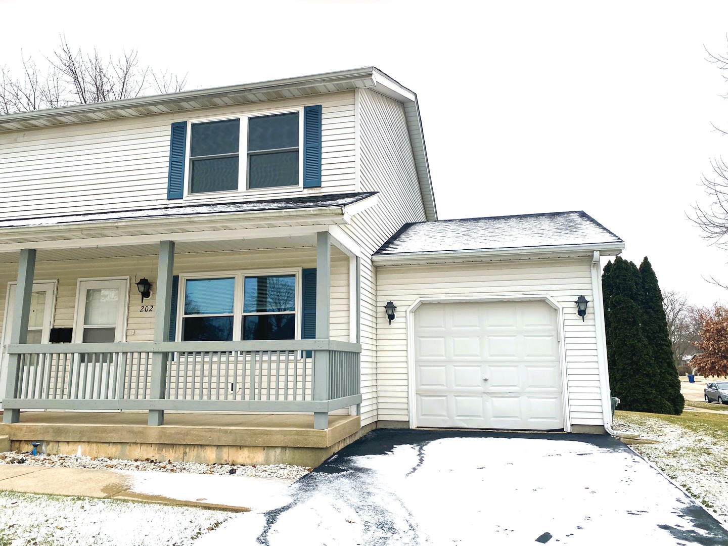 202 Chamberlain Drive DeKalb, IL 60115 - Photo 1 of 28 a front view of a house