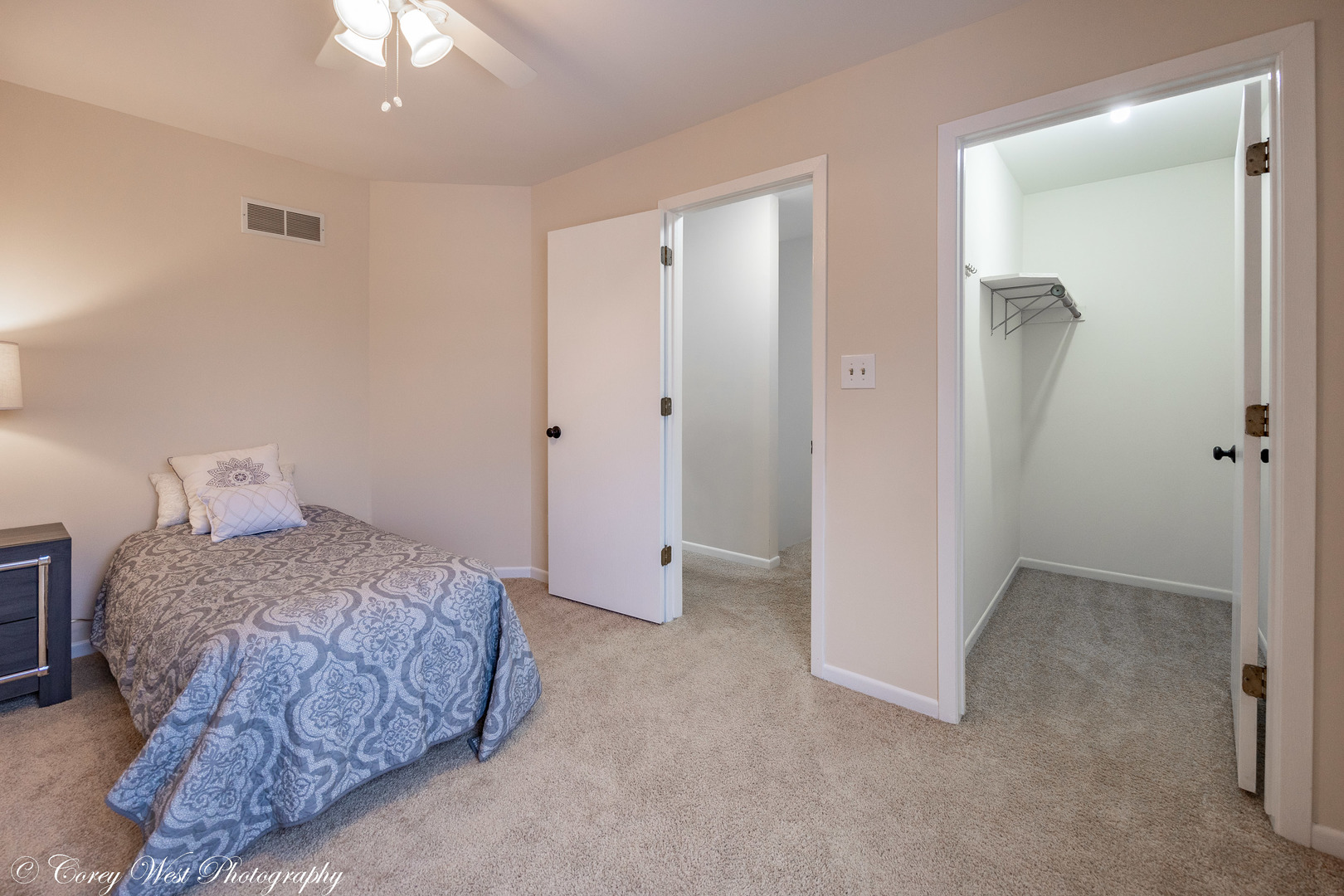 202 Chamberlain Drive DeKalb, IL 60115 - Photo 13 of 28 a bedroom with a bed and a shower