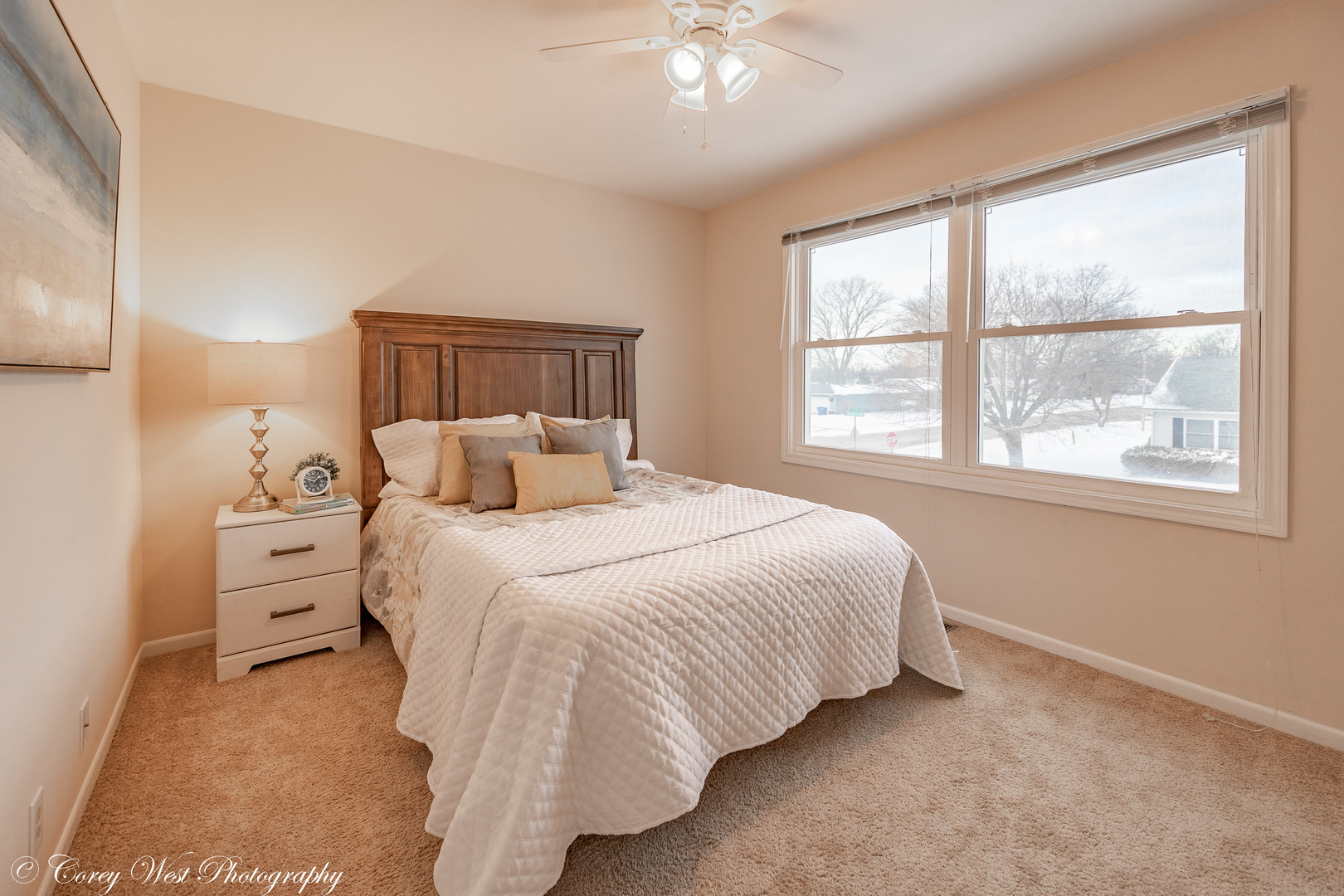 202 Chamberlain Drive DeKalb, IL 60115 - Photo 17 of 28 a bedroom with a bed and window