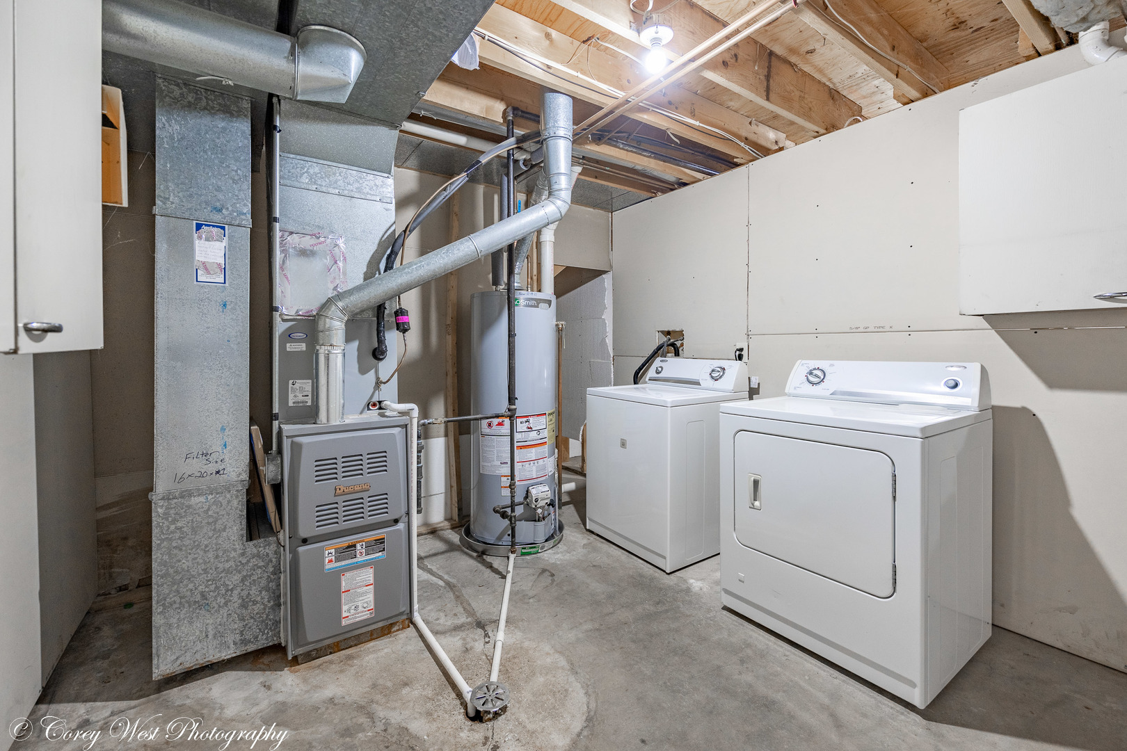 202 Chamberlain Drive DeKalb, IL 60115 - Photo 23 of 28 a utility room with dryer and washer