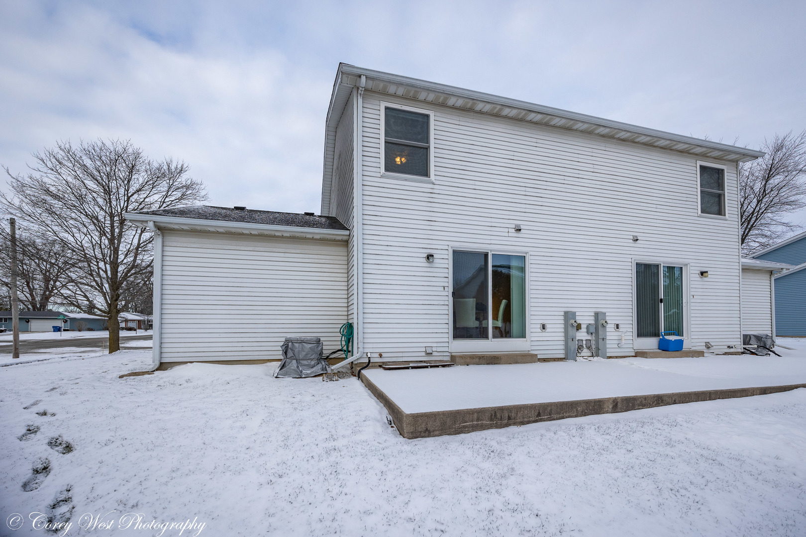 202 Chamberlain Drive DeKalb, IL 60115 - Photo 25 of 28 a view of a house with a yard