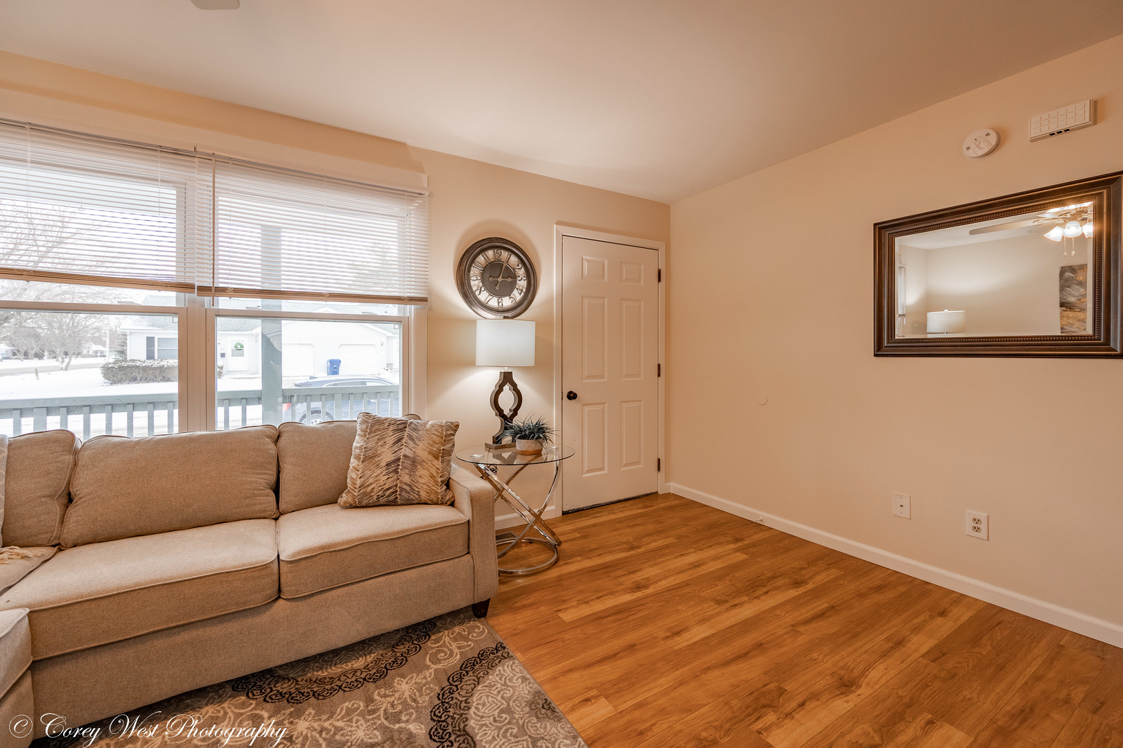 202 Chamberlain Drive DeKalb, IL 60115 - Photo 3 of 28 a living room with furniture and a large window