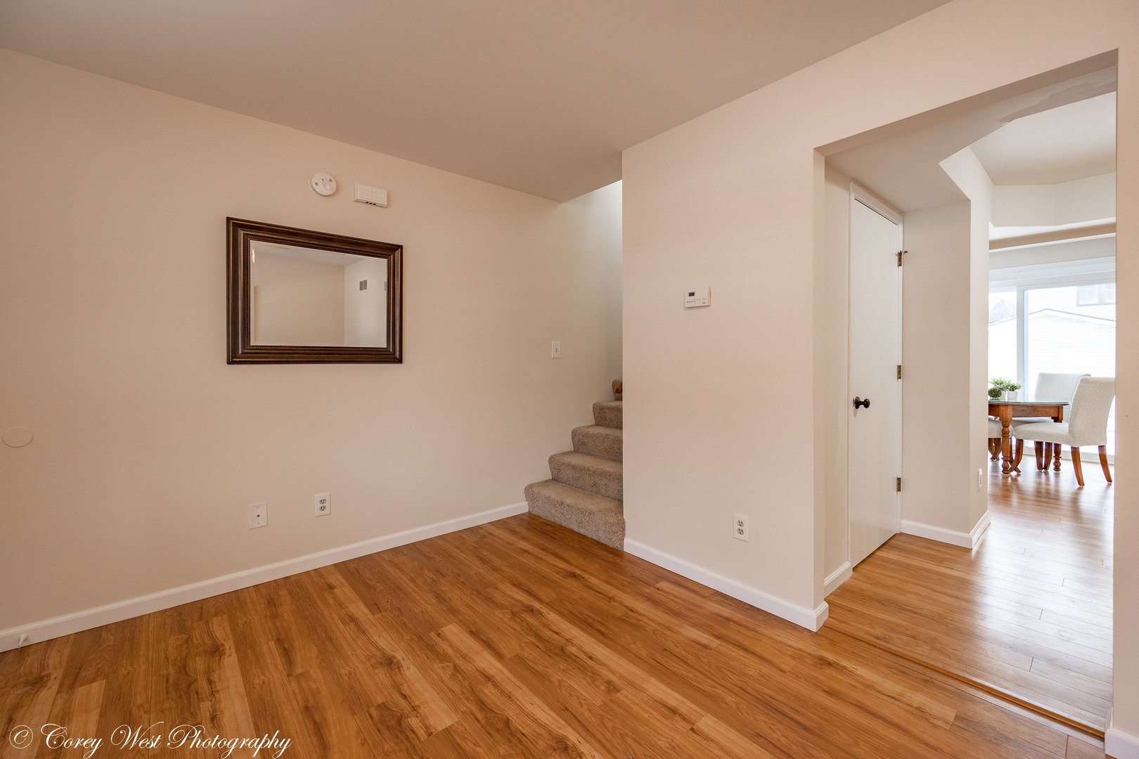 202 Chamberlain Drive DeKalb, IL 60115 - Photo 5 of 28 wooden floor in an empty room